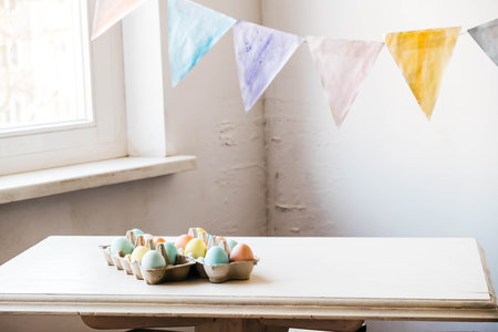 Cartons ofcolorful eggs ready for Easter at home.