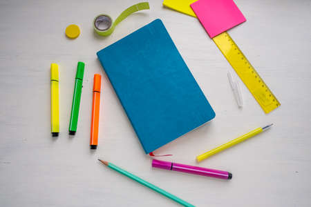 Turquoise cover planner with a pen, markers, ruler, stickers.. Planning and smart time management conceptの写真素材