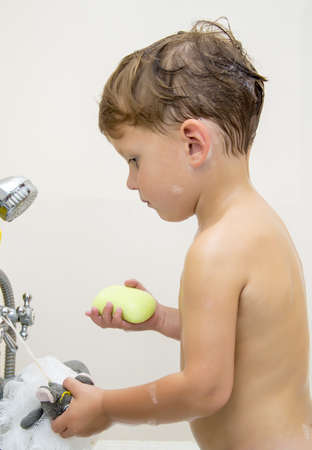 Boy with soapの写真素材