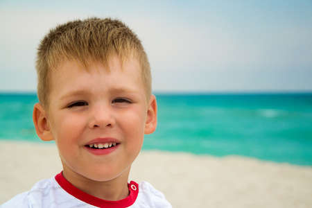 three year boy near sea, portraitの写真素材