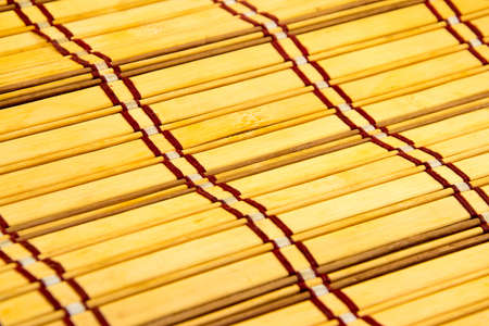 Background wood sticks with thread unitingの写真素材