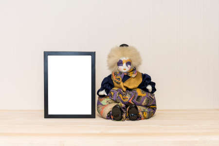 Blackframe mock up, ceramic and textil clown toy. Interior concept of kid roomの写真素材