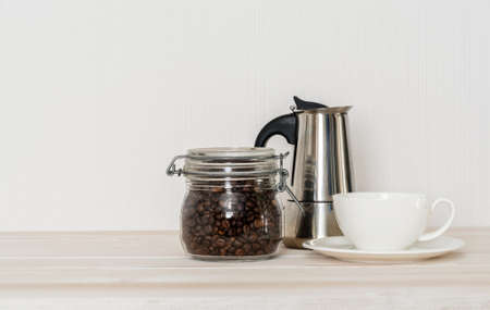 Coffee set with mug, coffee beans and retro coffee machineの写真素材