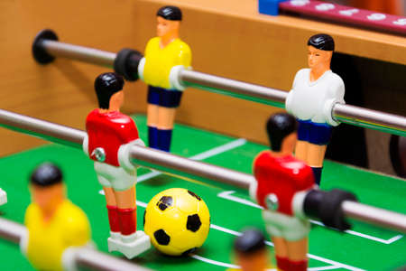 table football soccer game, close up, yellow ballの写真素材