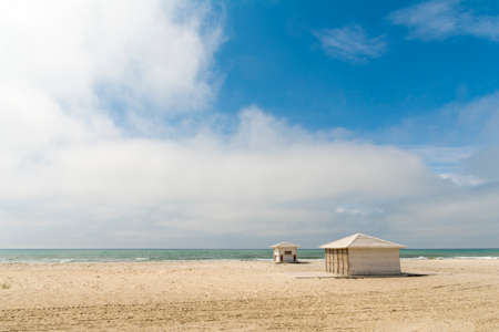 Empty sandy beach with closed barsの写真素材