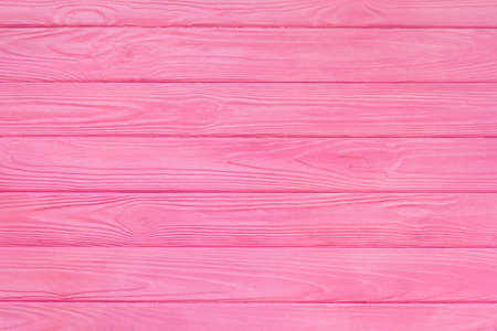 wood texture with pink color backgroundの写真素材