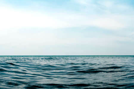 natural dark blue seawater surfaceの写真素材
