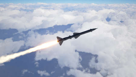 Cruise missile fly above the clouds 3d illustrationの写真素材