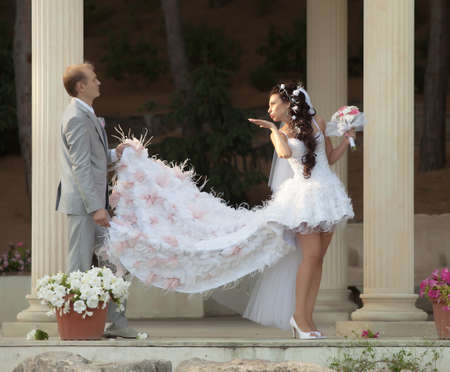 Newly wedded couple in the park  Just married in day of their wedding の写真素材