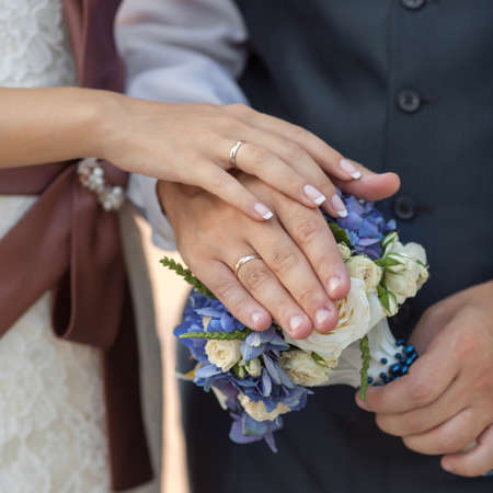 Wedding hands  Hands of newly wedded in time of wedding ceremonyの写真素材