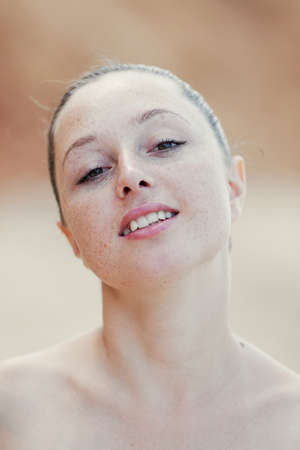 Girl at the sea  Portrait of young woman outdoors	の写真素材