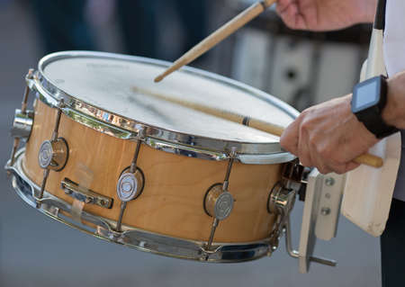 Drummer in a Marching Band  Drummers playing snare drums in paradeの写真素材