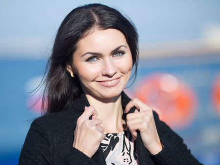 Portrait of attractive young woman outdoorsの写真素材