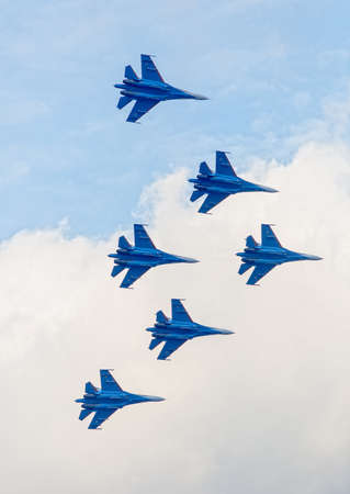 Six war jet planes in sky. Russian military jet planes showing aerobatics