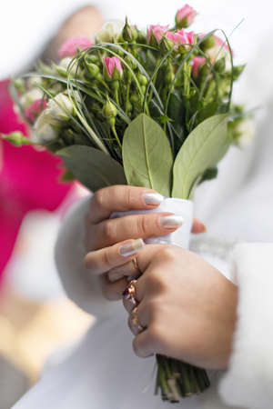 Beautiful bouquet in hand of brideの写真素材