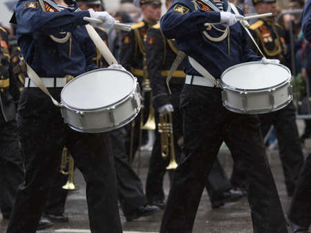 Drummers in a Marching Band. Navy orchestra participate in parade.