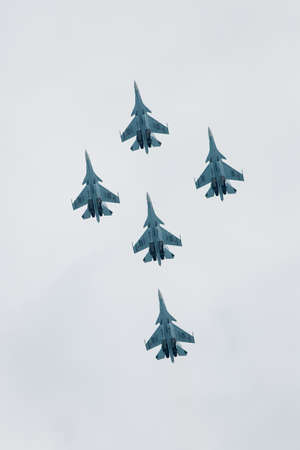 Five war jet planes in sky. Russian military jet planes showing aerobatics in time of military aviashowのeditorial素材