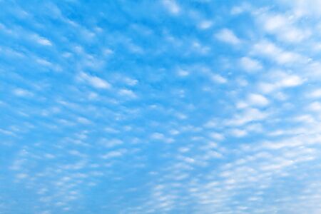 white fluffy clouds in the blue sky light clouds
