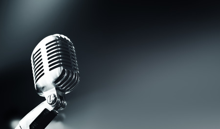vintage microphone Retro style mic on dark backgroundの写真素材