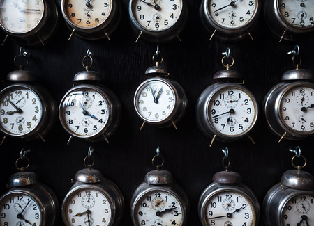 Analog and Retro Alarm Clocks vintage metal analog alarm clocks , retro background. Time is now, time is money, old times conceptの写真素材