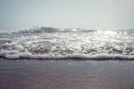 sea wave and sky at sunset beach and tropical seaの写真素材