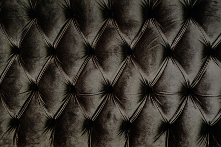 close up of brown velvet backrest sofa with vintage style