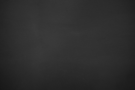Grey black grunge textured wall backgroundの写真素材