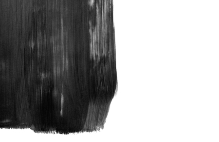 black paint brush stroke texture on white backgroundの写真素材