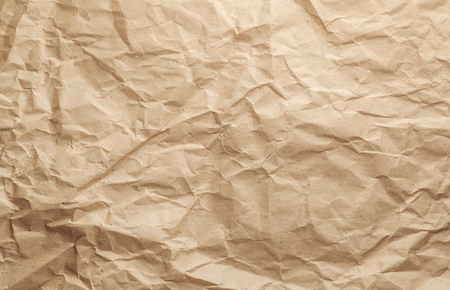 crumpled brown cardboard craft paper textureの写真素材