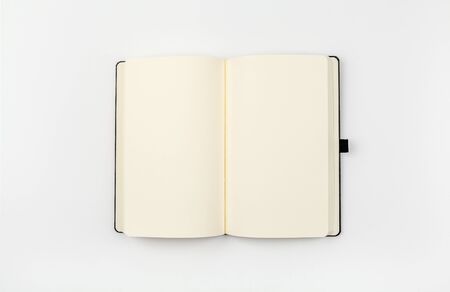 Blank open notebook mockup on white backgroundの写真素材