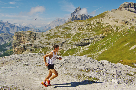 SEXTEN, IT - CIRCA AUGUST 2011.Mountain runner in the Dolomites.のeditorial素材