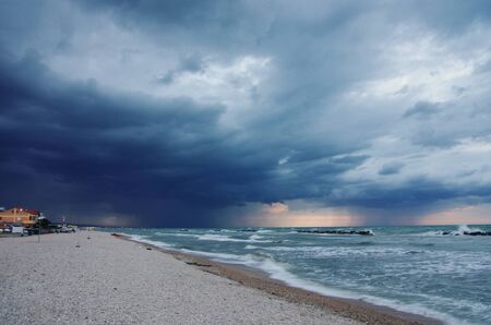 Approaching storm on the beach of Senigallia, on the Adriatic sea.