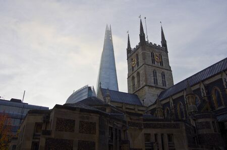 Southwark cathedral and The Shard, gothic and modern architectureの写真素材