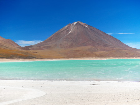 Green lagoon an Licancabur volcano on the Andean altiplano of Bolivia, South Americaの写真素材
