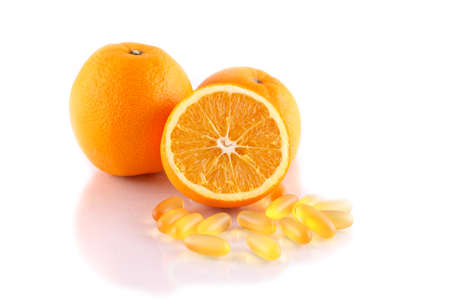 Orange fruit with vitamin isolated on white background の写真素材