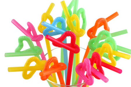 colorful drinking straws on a white background の写真素材