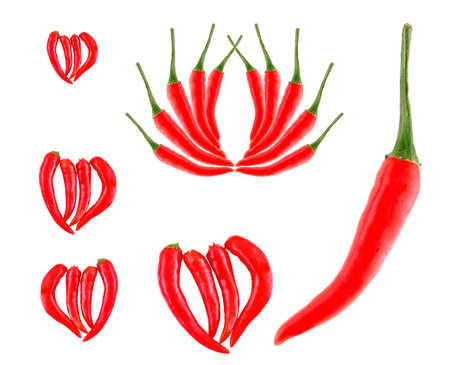 Heart made of red hot chili pepper isolated on white background の写真素材
