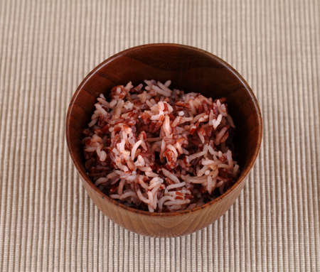 Red rice in a small ceramic dishの写真素材