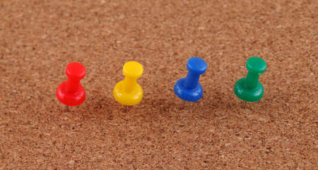 pushpins on wood billboard の写真素材