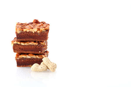 cashew nut brownie isolated on white background の写真素材