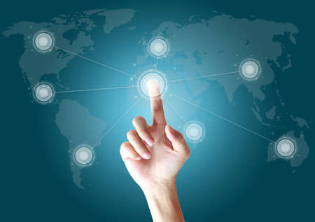 hand touching button on the screen worldの写真素材