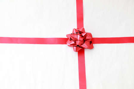  Red holiday bow on white background