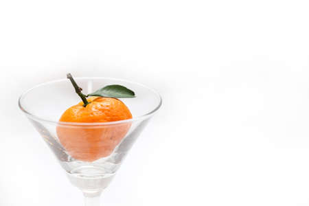 orange in glassの写真素材