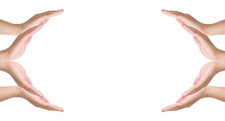 Conceptual symbol of eight human hands making a circle on white with a copy space house on the sky at the centre の写真素材