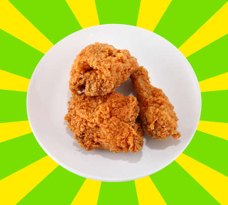 A white plate with fresh, crispy fried chicken の写真素材