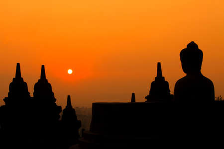 Morning silhouette of Buddha image on Borobudur temple,Yogyakarta. Java, Indonesia.の写真素材