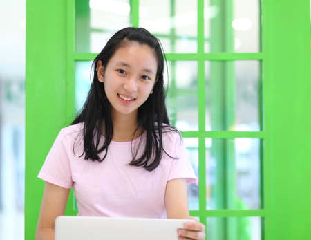 beautiful asian woman using laptop computer.