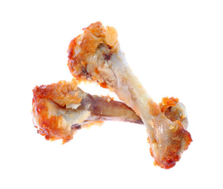 chicken bone isolated white.の写真素材