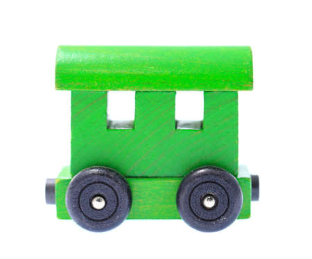 Wooden toy green car for children isolated on whiteの写真素材