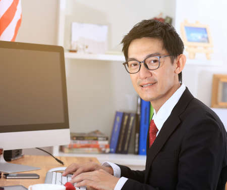 Business man use computer in office .business man working on computer.